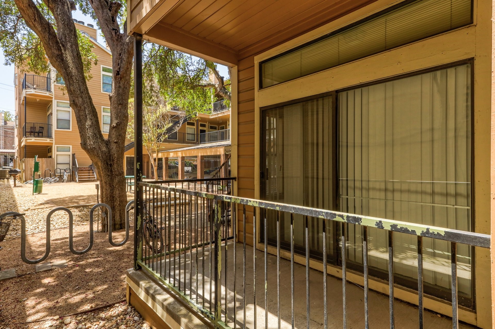 2802 Nueces Street, Unit 101 Austin, TX 78705 - Photo 15 of 20 a view of balcony with furniture