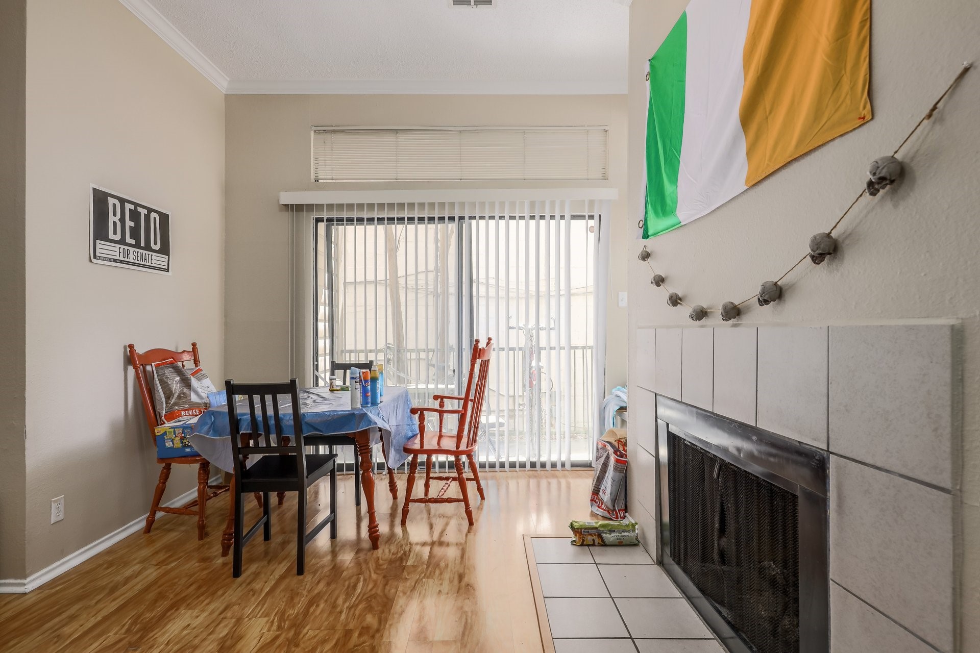 2802 Nueces Street, Unit 101 Austin, TX 78705 - Photo 7 of 20 a view of a dining room with furniture window and wooden floor