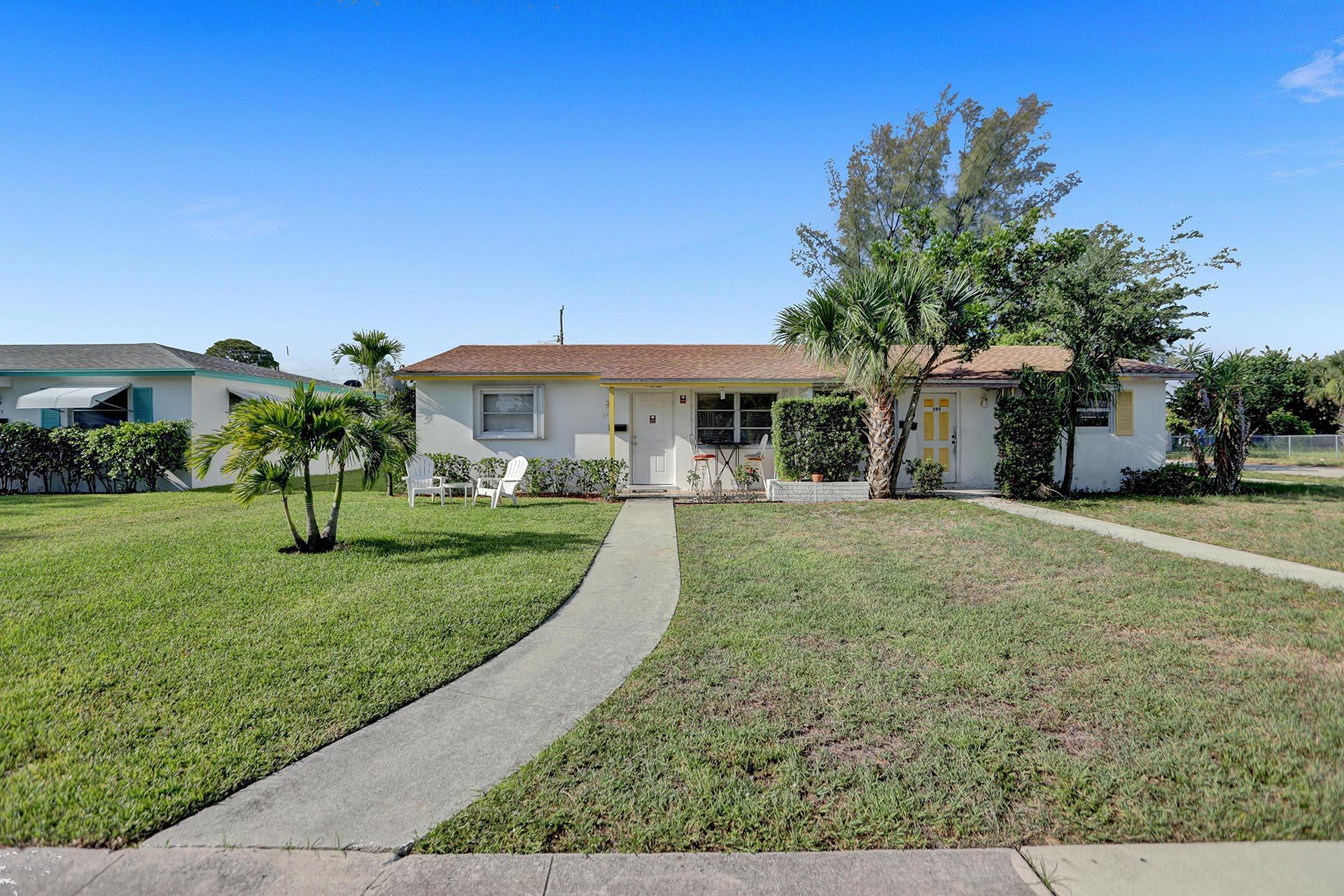591 Silver Beach Road Riviera Beach, FL 33403 - Photo 3 of 29 G87A4063