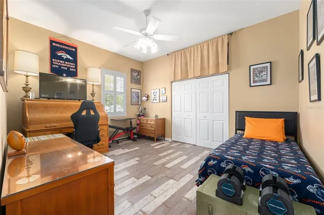 a bathroom with a sink vanity and a mirror