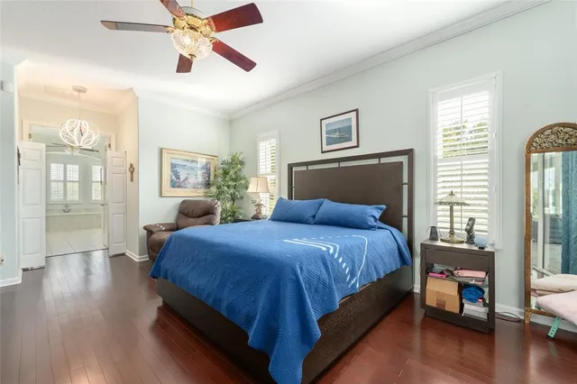a spacious bathroom with a granite countertop tub sink and mirror