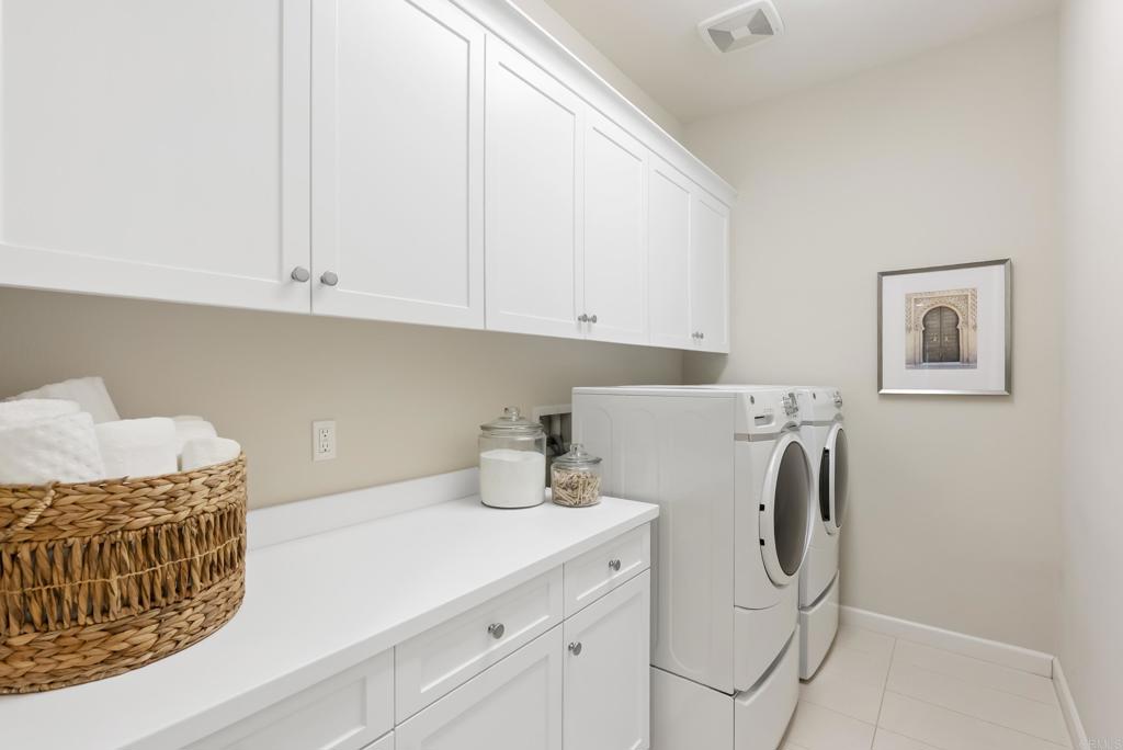 1352 Baumgartner Way Escondido, CA 92026 - Photo 21 of 47 a utility room with dryer and washer