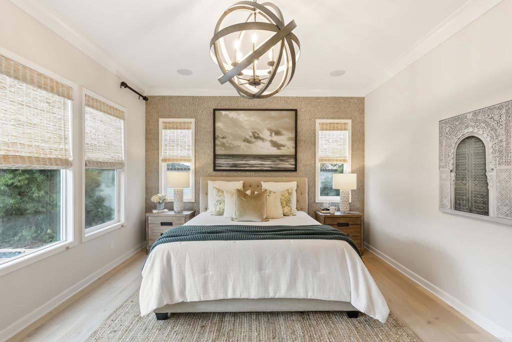 1352 Baumgartner Way Escondido, CA 92026 - Photo 23 of 47 a bedroom with a bed and a painting on the wall