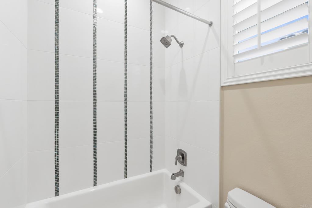 1352 Baumgartner Way Escondido, CA 92026 - Photo 34 of 47 a bath room with a sink and a tub