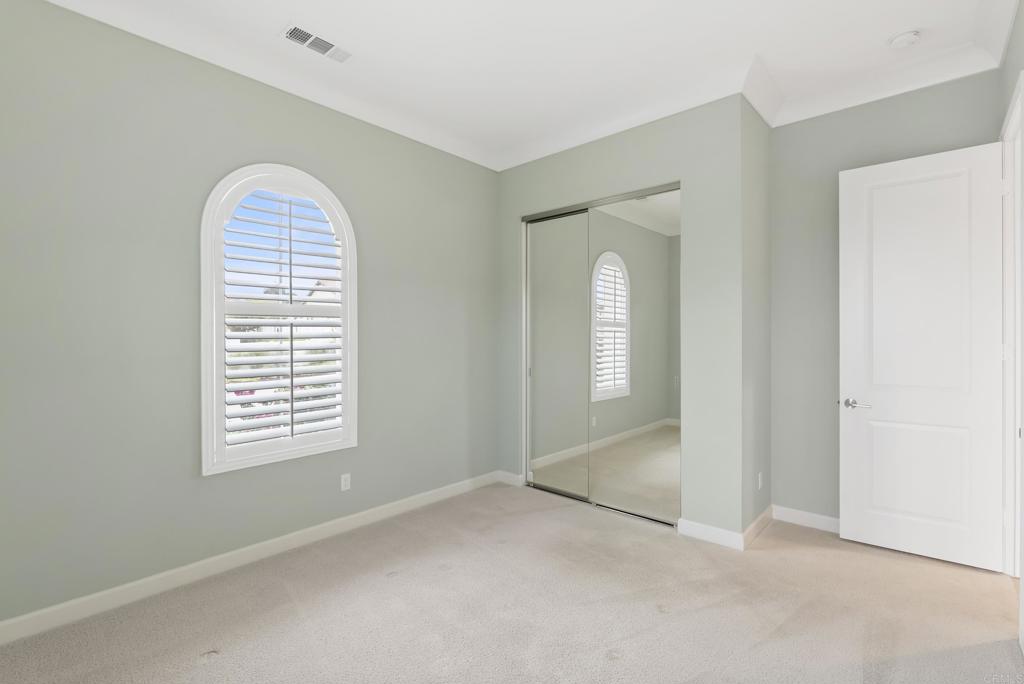 1352 Baumgartner Way Escondido, CA 92026 - Photo 36 of 47 an empty room with windows