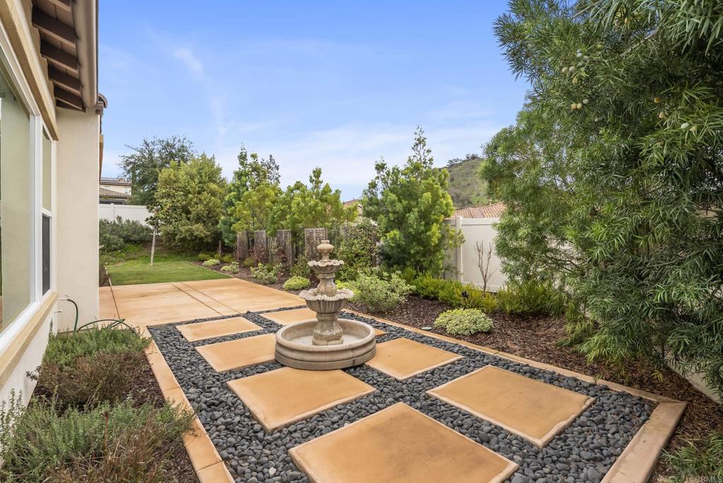 1352 Baumgartner Way Escondido, CA 92026 - Photo 41 of 47 a view of a backyard with sitting area