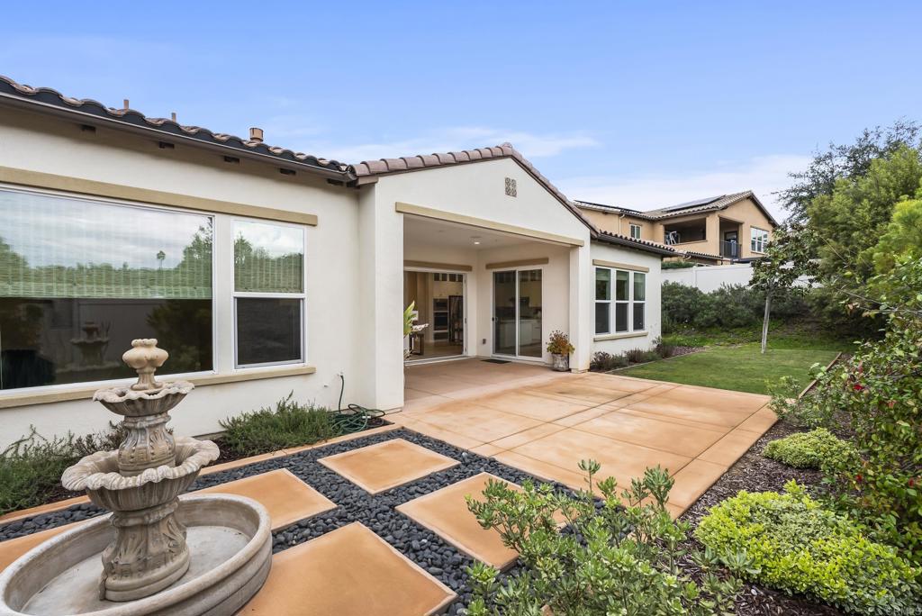 1352 Baumgartner Way Escondido, CA 92026 - Photo 42 of 47 a front view of a house with garden