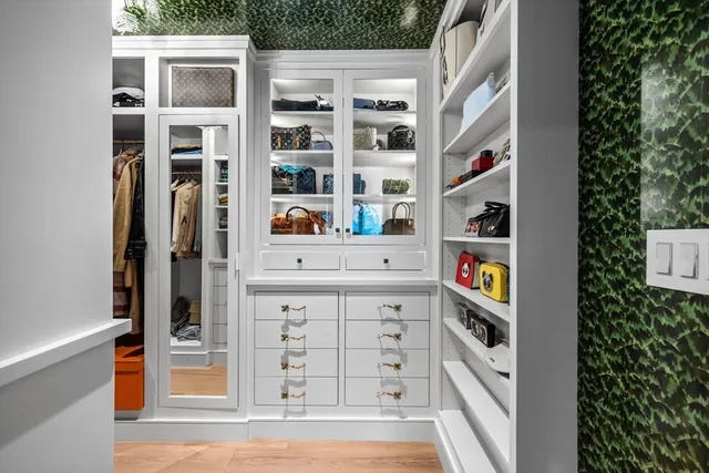 a shelf of storage and utility room