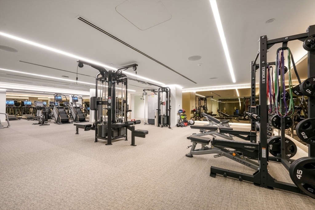 10 Rowes Wharf, Unit 1003 Boston, MA 02110 - Photo 17 of 25 a view of a room with gym equipment