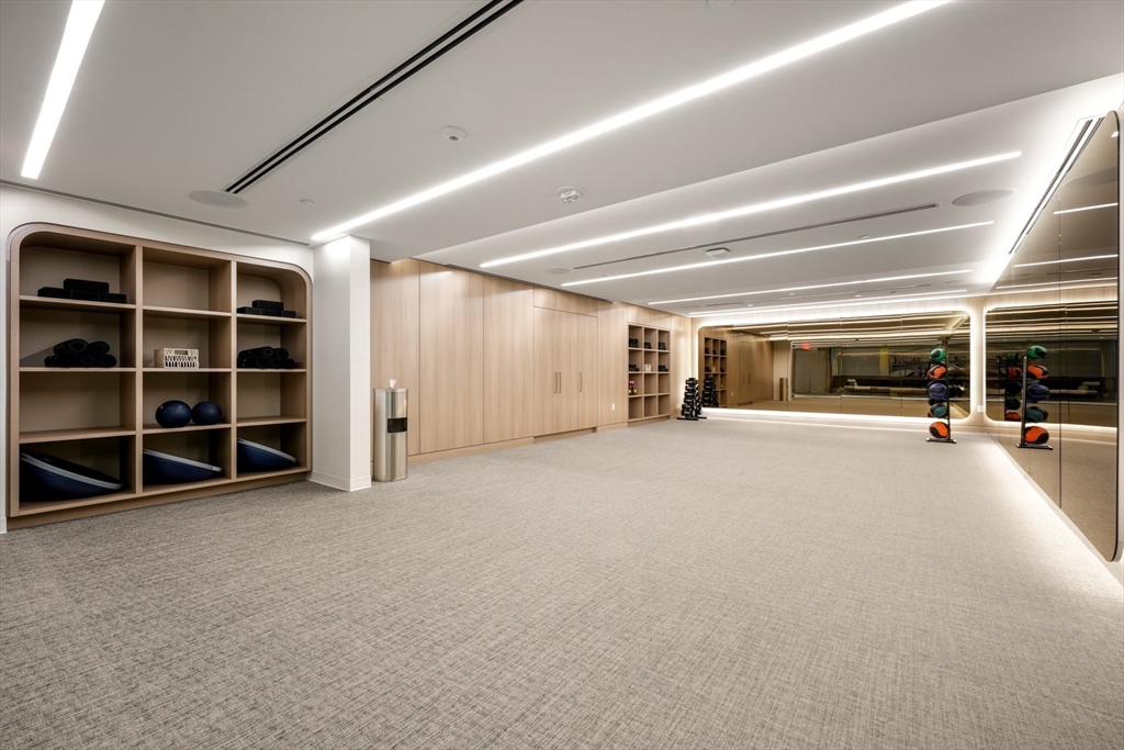 10 Rowes Wharf, Unit 1003 Boston, MA 02110 - Photo 18 of 25 a view of an empty room with furniture