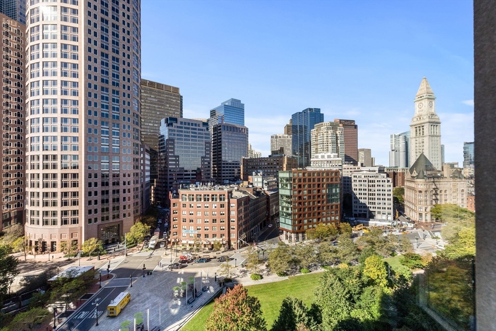 10 Rowes Wharf, Unit 1003 Boston, MA 02110 - Photo 5 of 25 a view of a city with tall buildings