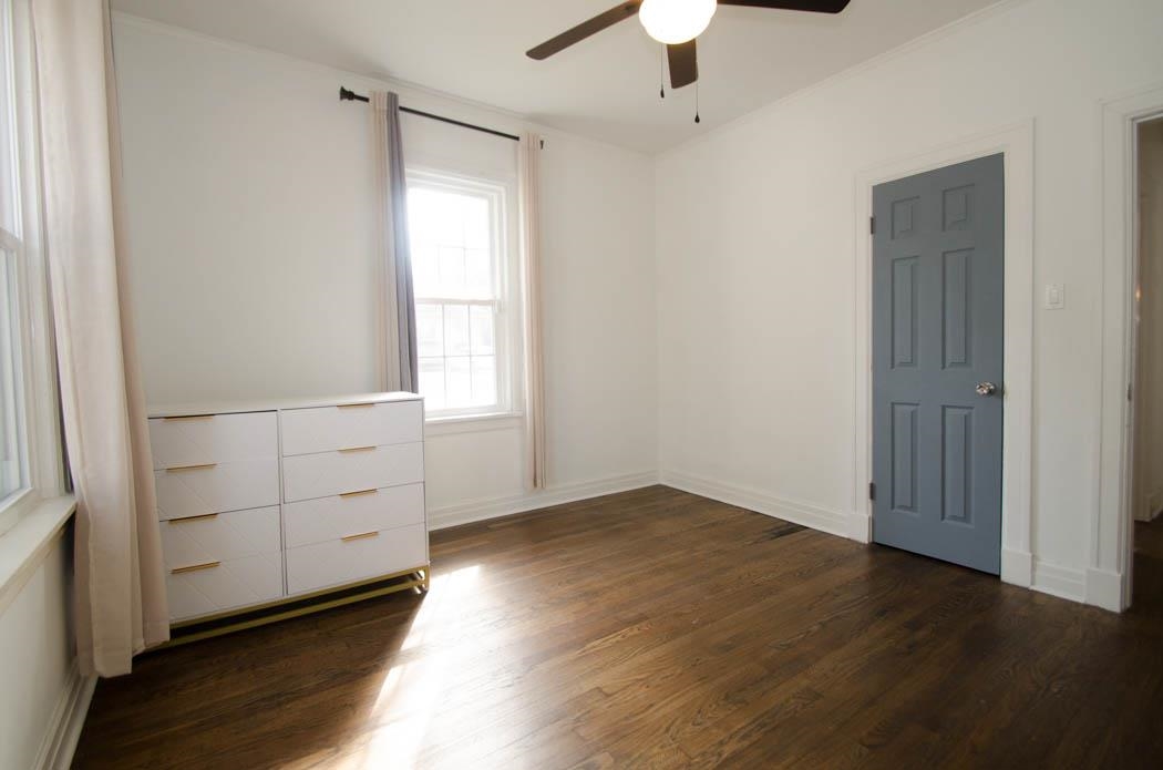 4572 Princeton Road Memphis, TN 38117 - Photo 14 of 24 Unfurnished bedroom with dark wood-type flooring and ceiling fan