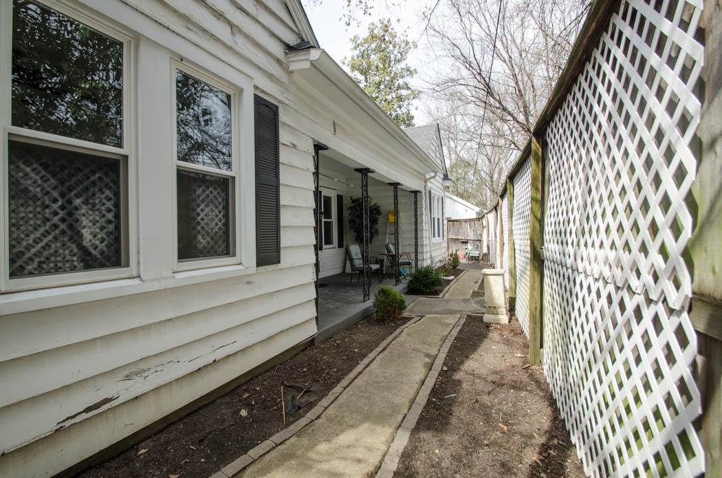 4572 Princeton Road Memphis, TN 38117 - Photo 16 of 24 a view of a house with a backyard