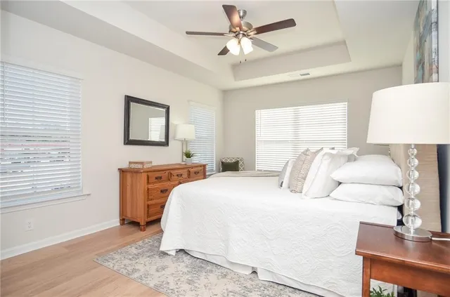 a bedroom with a large bed and a table