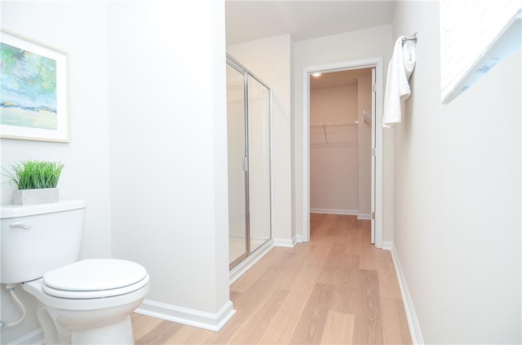 4553 High Rdg Court Sugar Hill, GA 30518 - Photo 25 of 39 a bathroom with a sink and a toilet