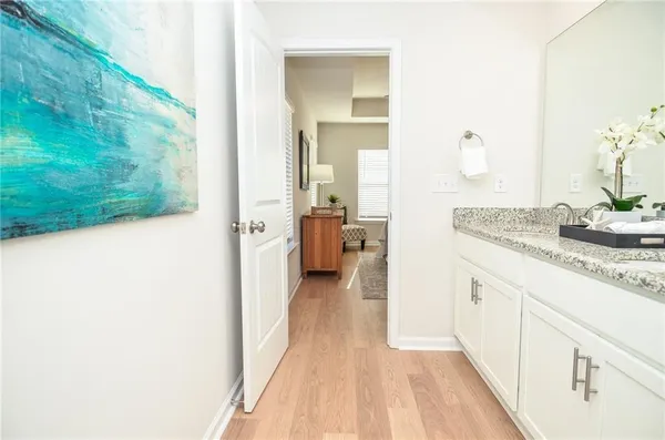 a view of a bathroom from the hallway