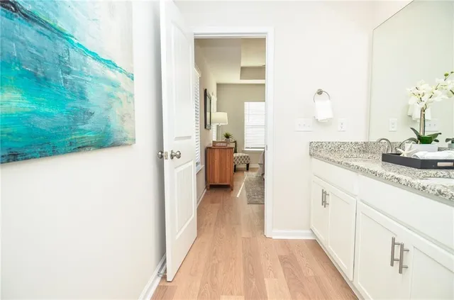 a view of a bathroom from the hallway