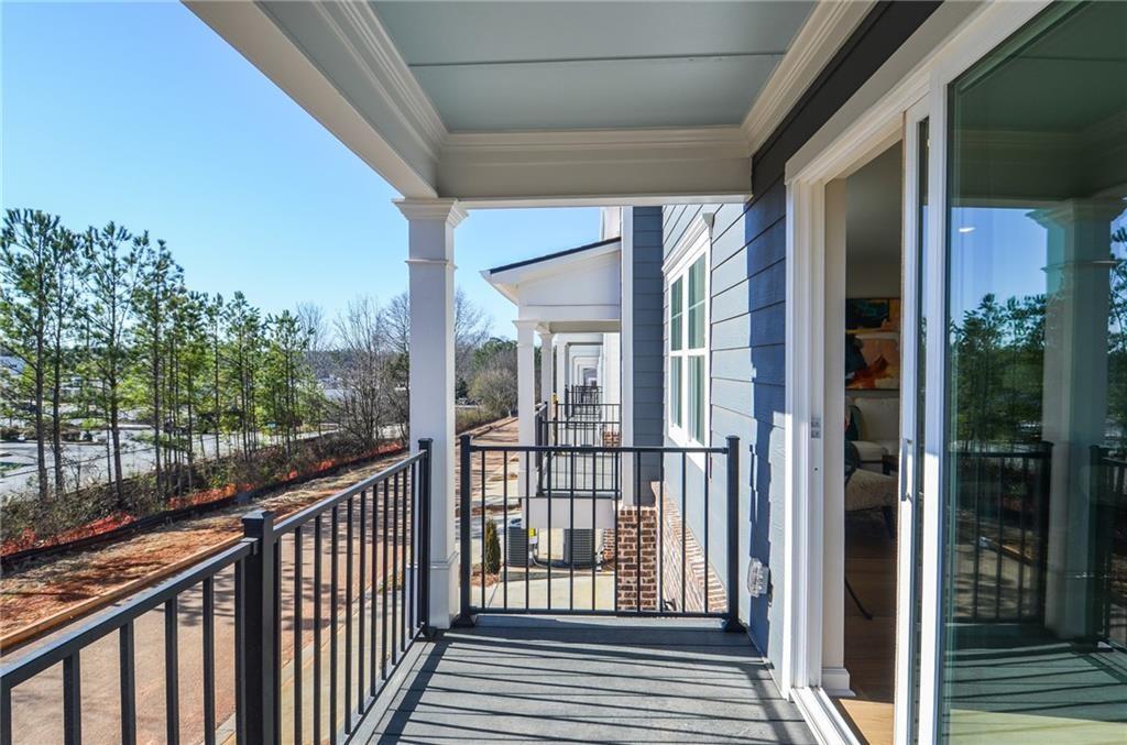 4553 High Rdg Court Sugar Hill, GA 30518 - Photo 33 of 39 a view of a balcony with wooden floor