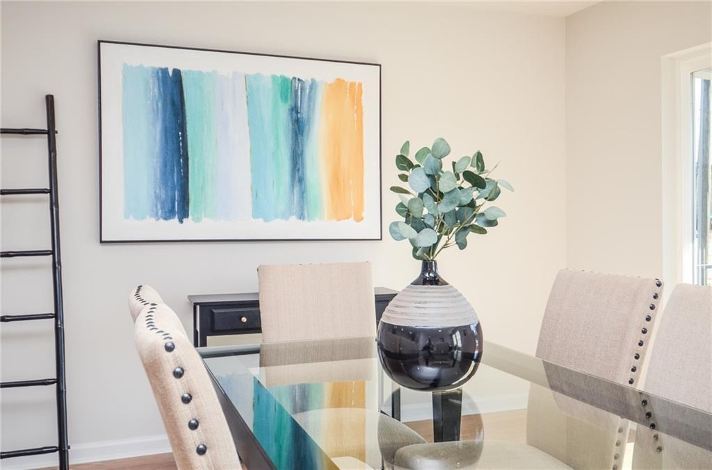 4553 High Rdg Court Sugar Hill, GA 30518 - Photo 37 of 39 a vase of flowers sitting on a table