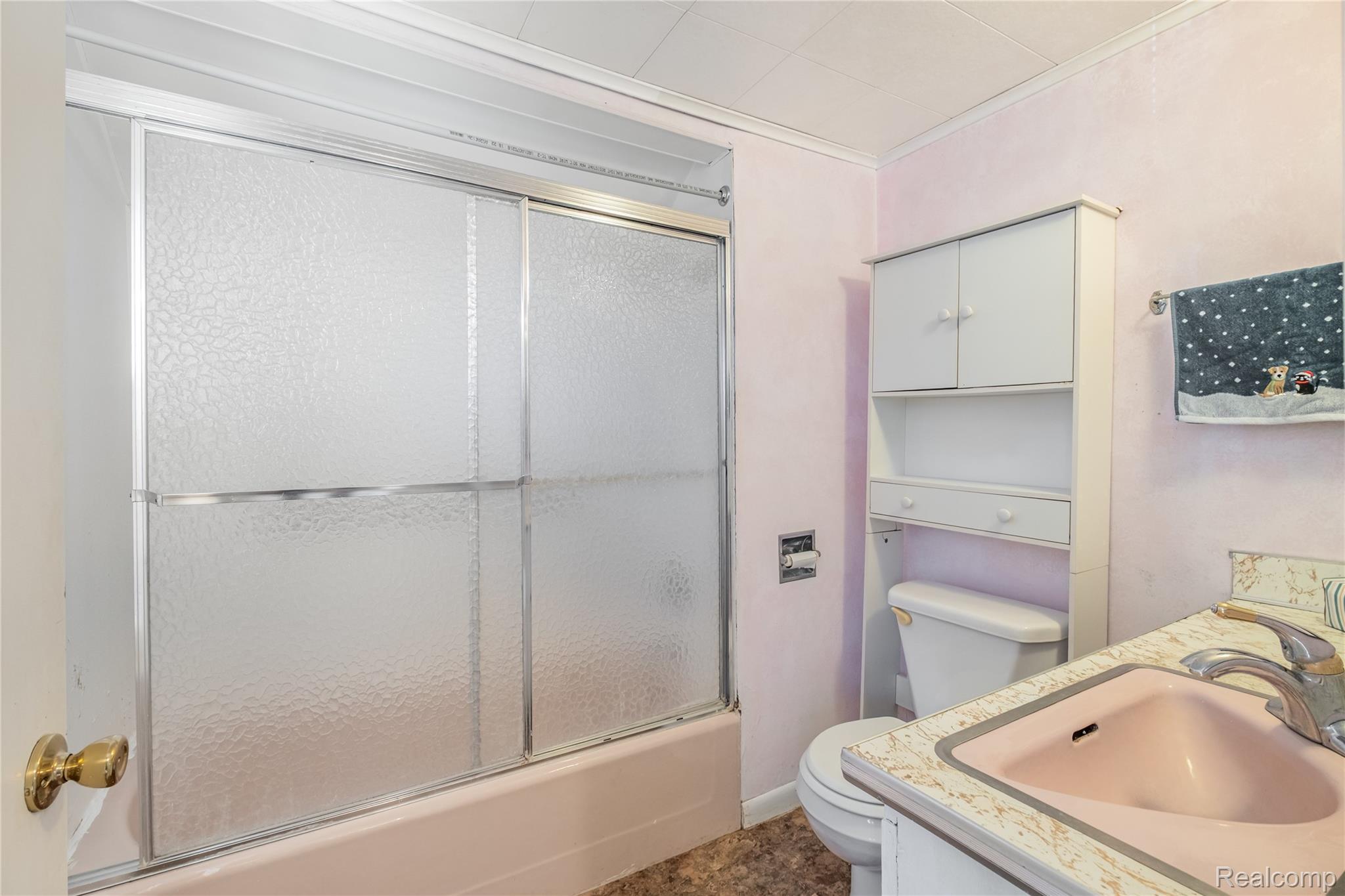 5447 North State Road Davison, MI 48423 - Photo 10 of 29 Bathroom with enclosed tub / shower combo and vanity