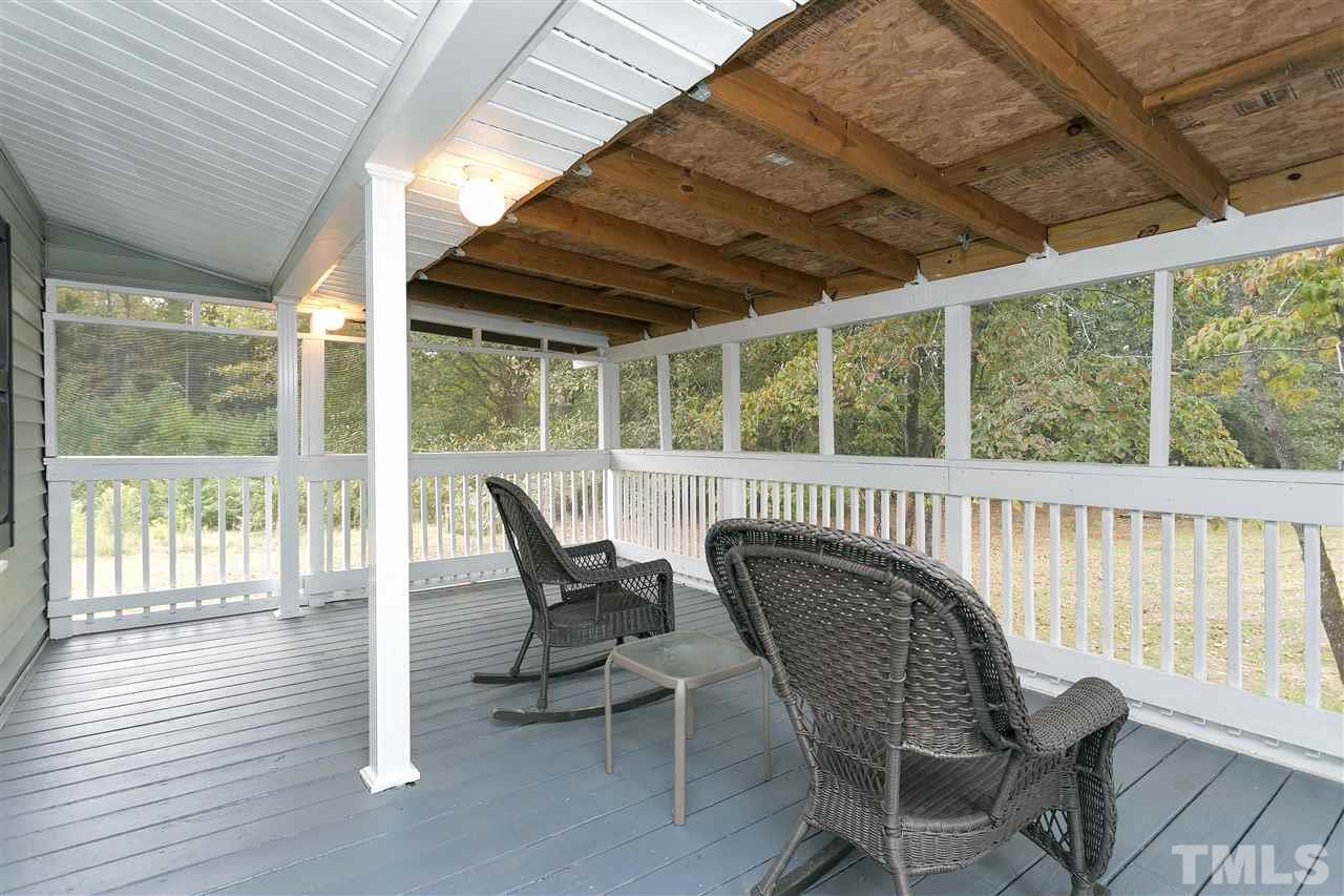 3315 Zacks Mill Road, Unit C Angier, NC 27501 - Photo 11 of 25 a view of a chairs and table in the roof deck