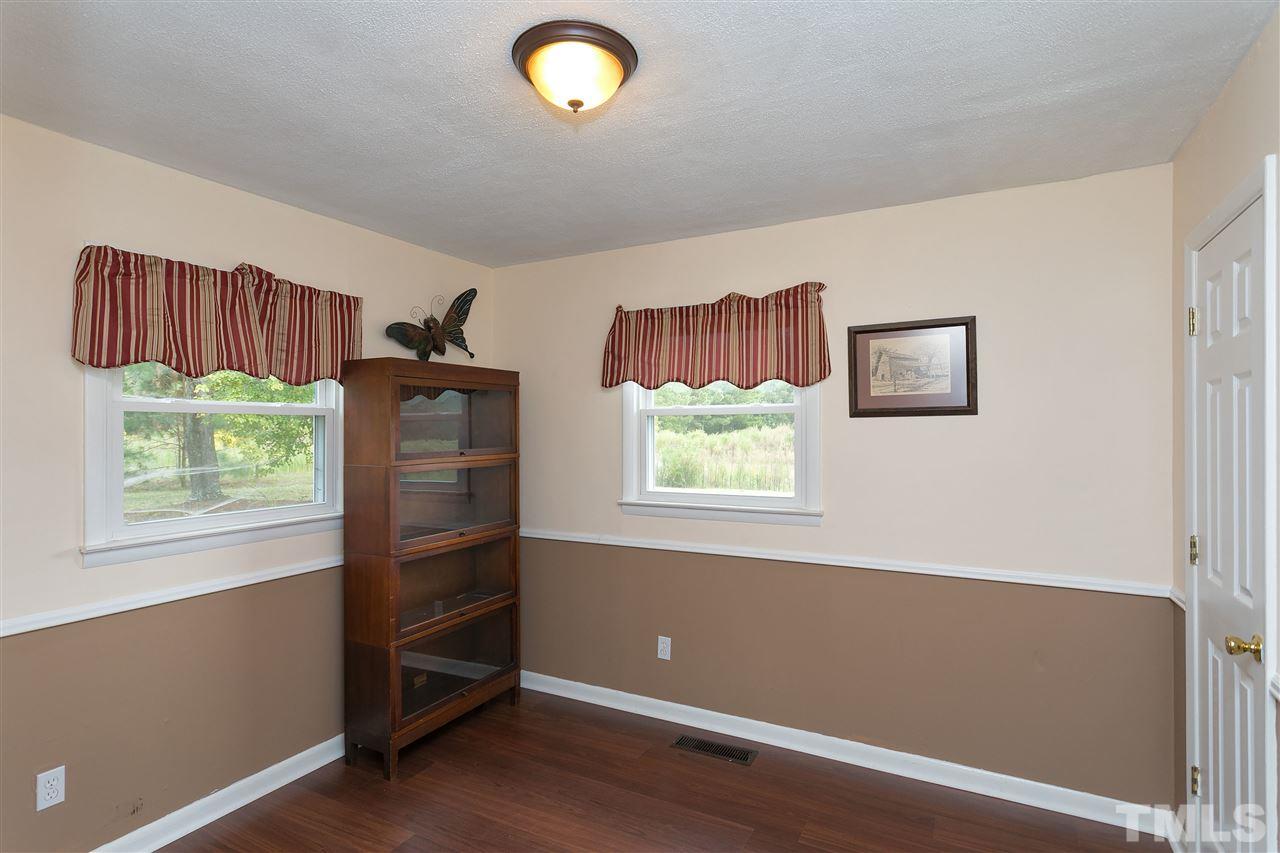3315 Zacks Mill Road, Unit C Angier, NC 27501 - Photo 14 of 25 a view of a livingroom with furniture and a window