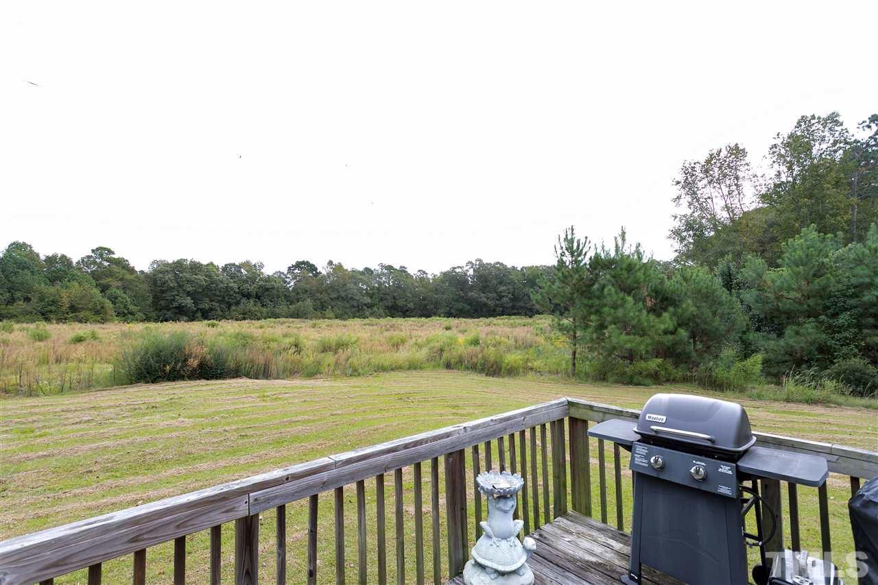 3315 Zacks Mill Road, Unit C Angier, NC 27501 - Photo 20 of 25 a balcony with an outdoor space