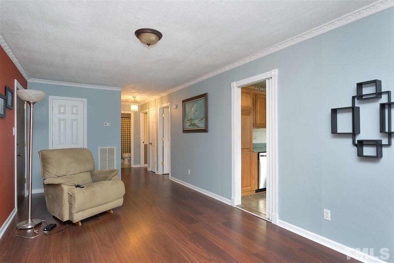 3315 Zacks Mill Road, Unit C Angier, NC 27501 - Photo 3 of 25 a living room with furniture and a window