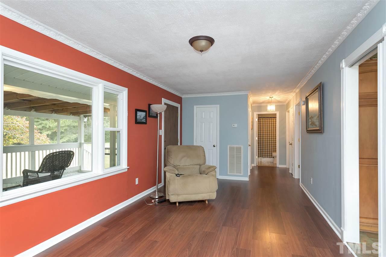 3315 Zacks Mill Road, Unit C Angier, NC 27501 - Photo 6 of 25 a living room with furniture and a large window