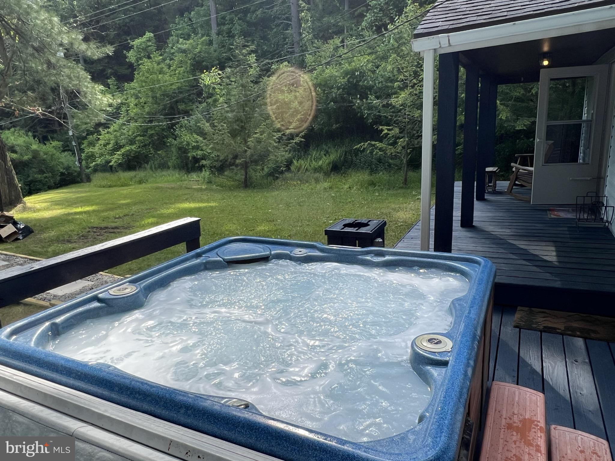 193 Gravelly Run Road McHenry, MD 21541 - Photo 12 of 57 a view of a backyard with sitting area