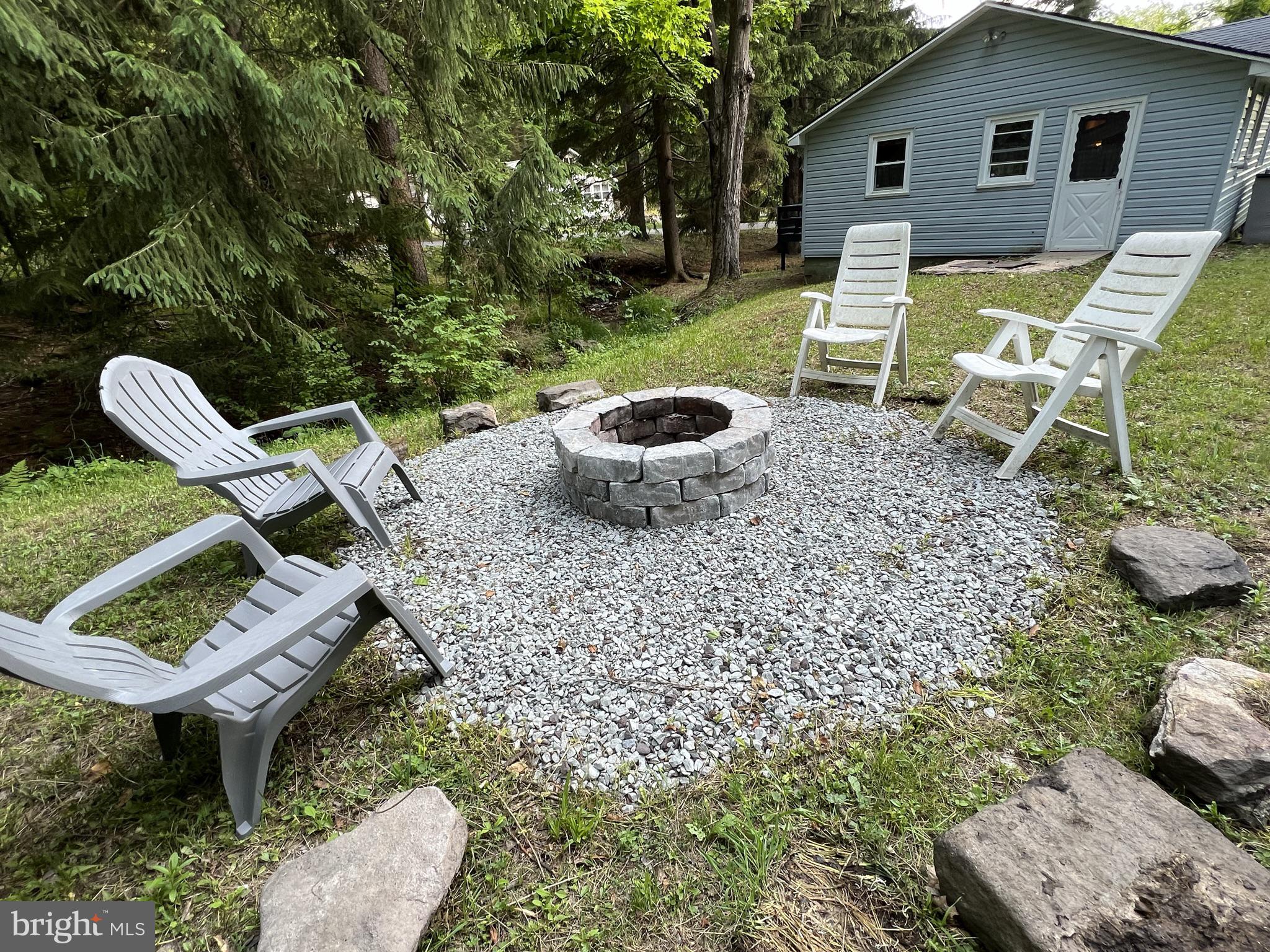 193 Gravelly Run Road McHenry, MD 21541 - Photo 14 of 57 a view of an outdoor sitting area with couch