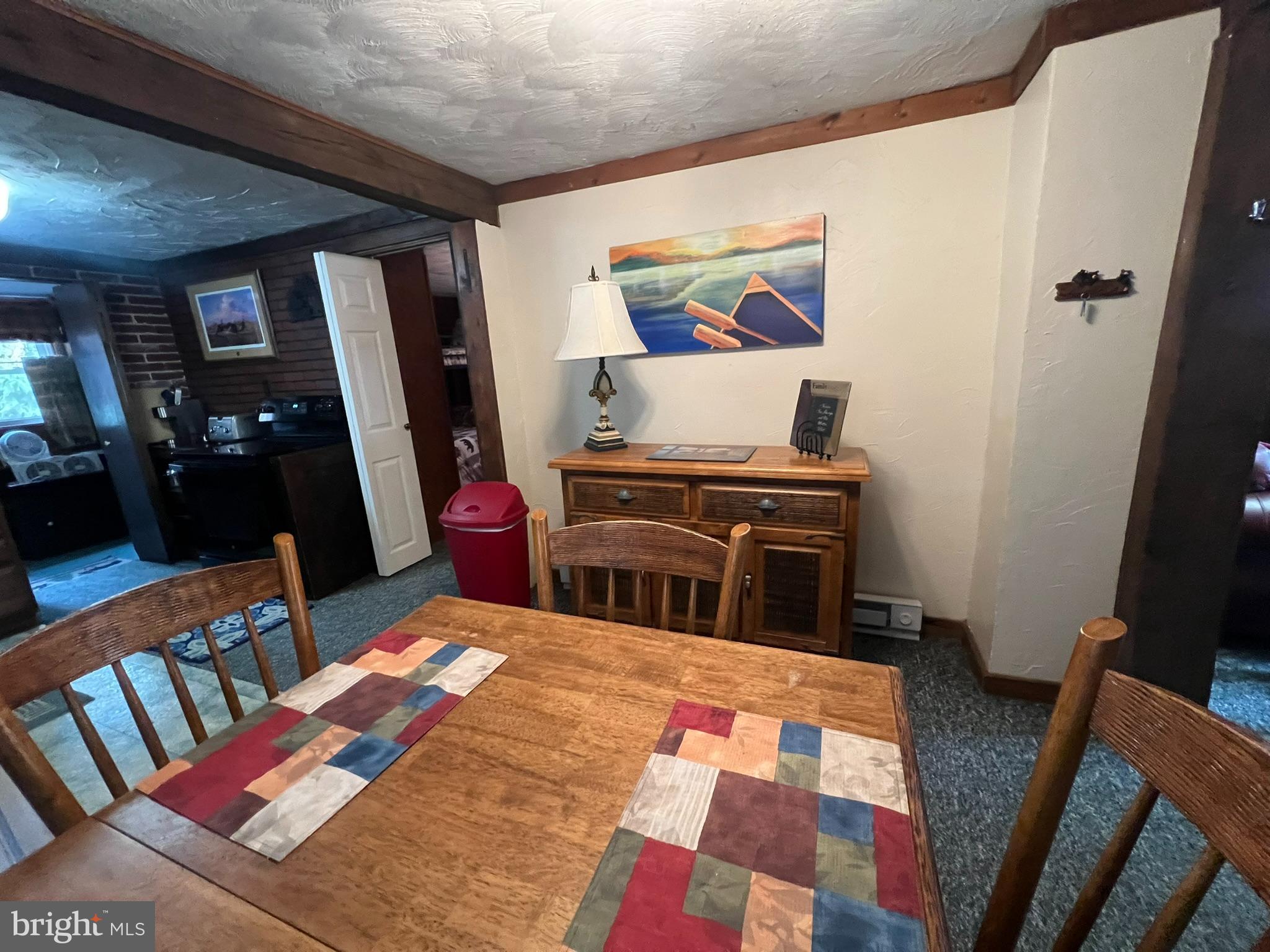 193 Gravelly Run Road McHenry, MD 21541 - Photo 20 of 57 a bedroom with a bed and a flat screen tv