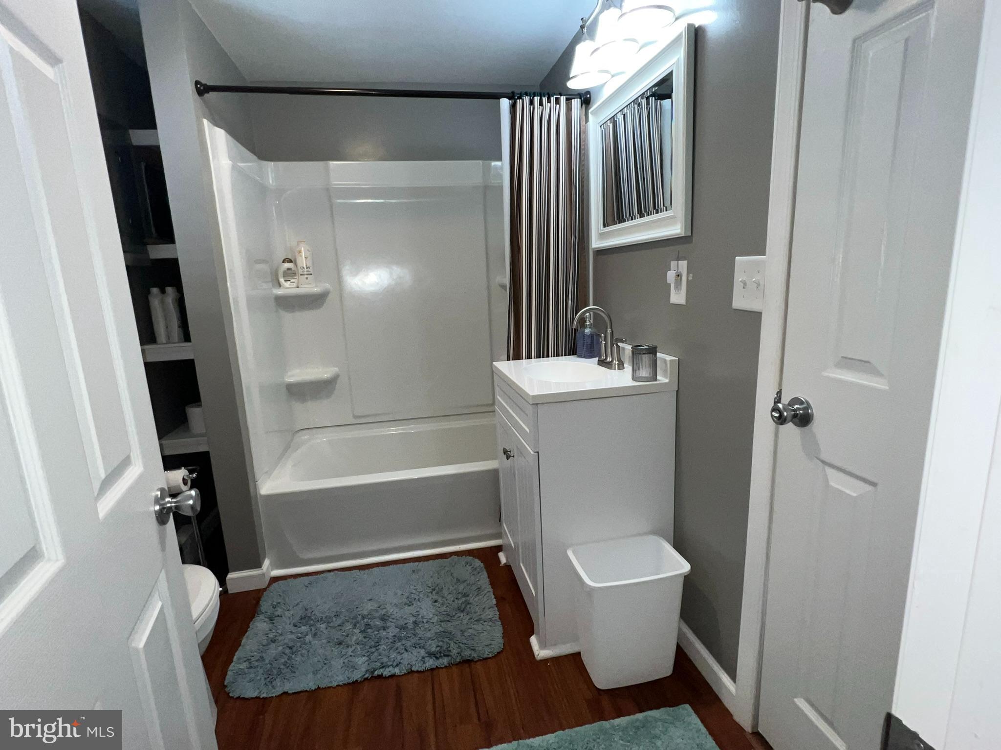 193 Gravelly Run Road McHenry, MD 21541 - Photo 36 of 57 a bathroom with a sink toilet and shower