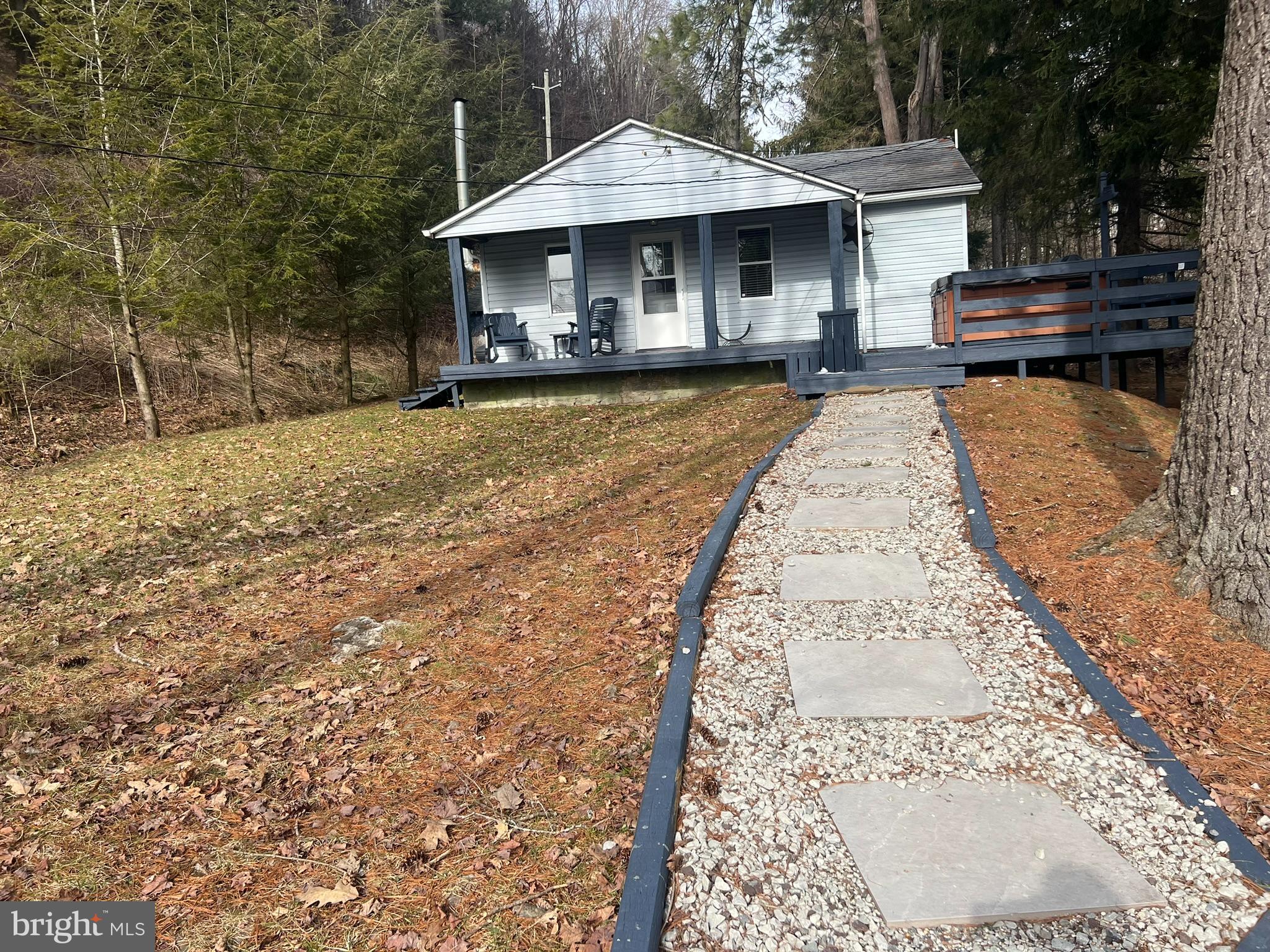 193 Gravelly Run Road McHenry, MD 21541 - Photo 5 of 57 a front view of a house with yard