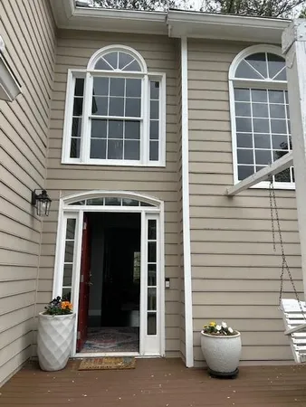 a front view of a house with a garage