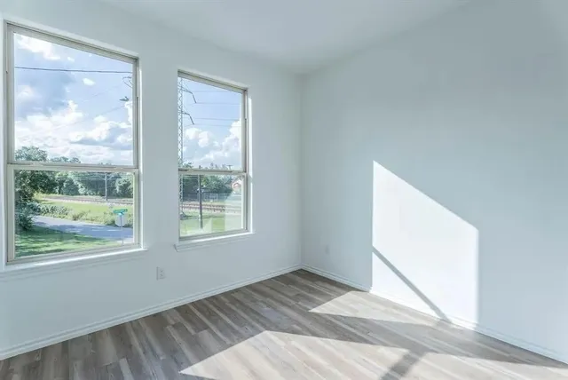 a view of a room that has a window in it
