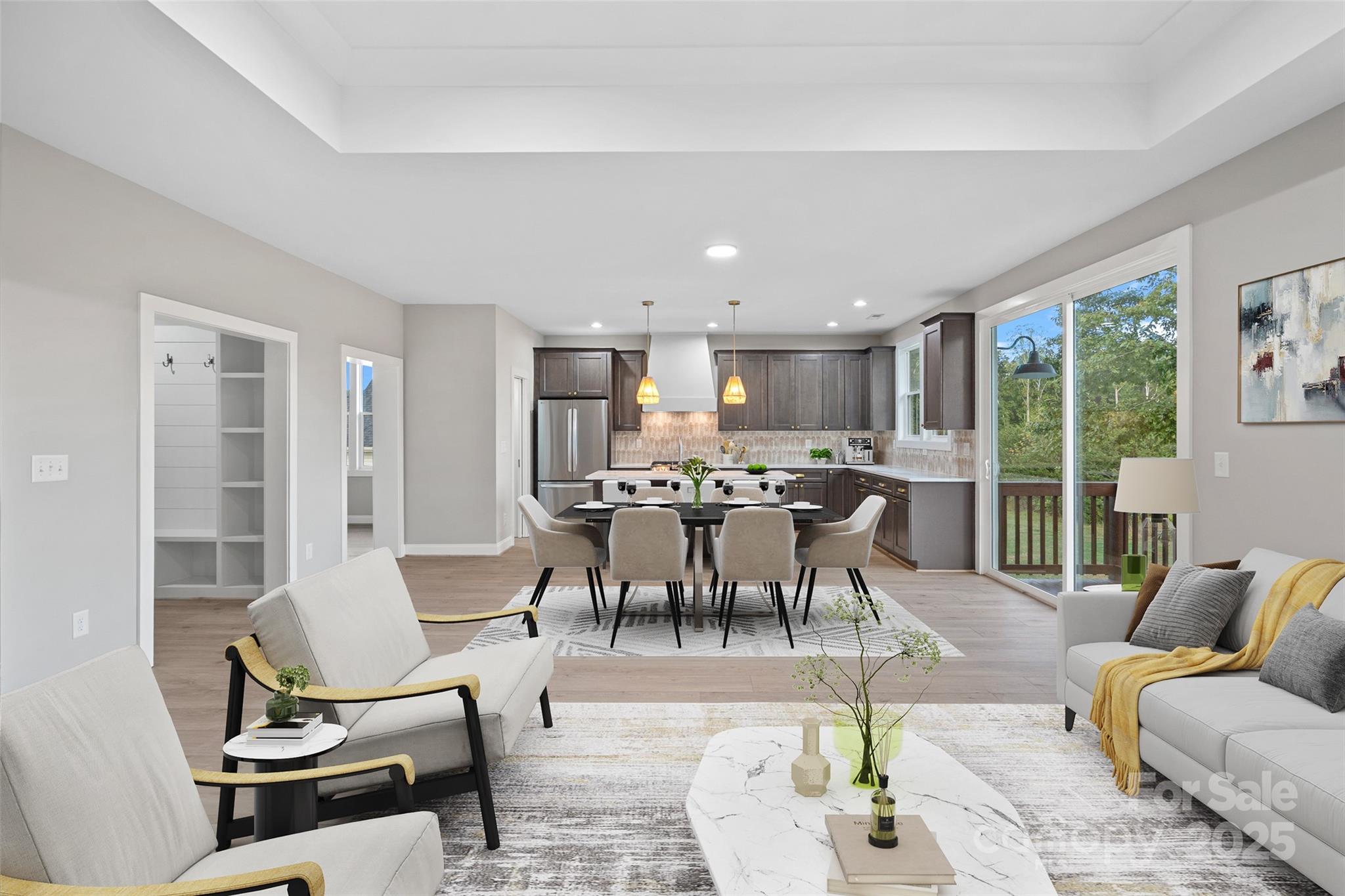 155 Rimrock Road Harmony, NC 28634 - Photo 11 of 39 a living room with furniture and a dining table with kitchen view