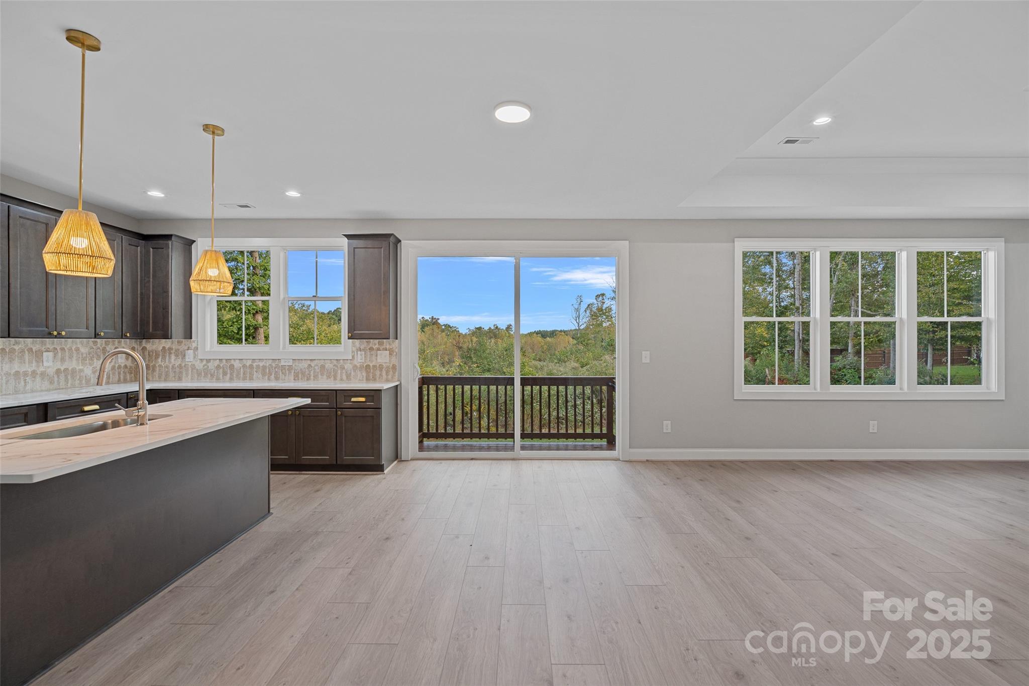 155 Rimrock Road Harmony, NC 28634 - Photo 17 of 39 a view of kitchen with wooden floor and electronic appliances