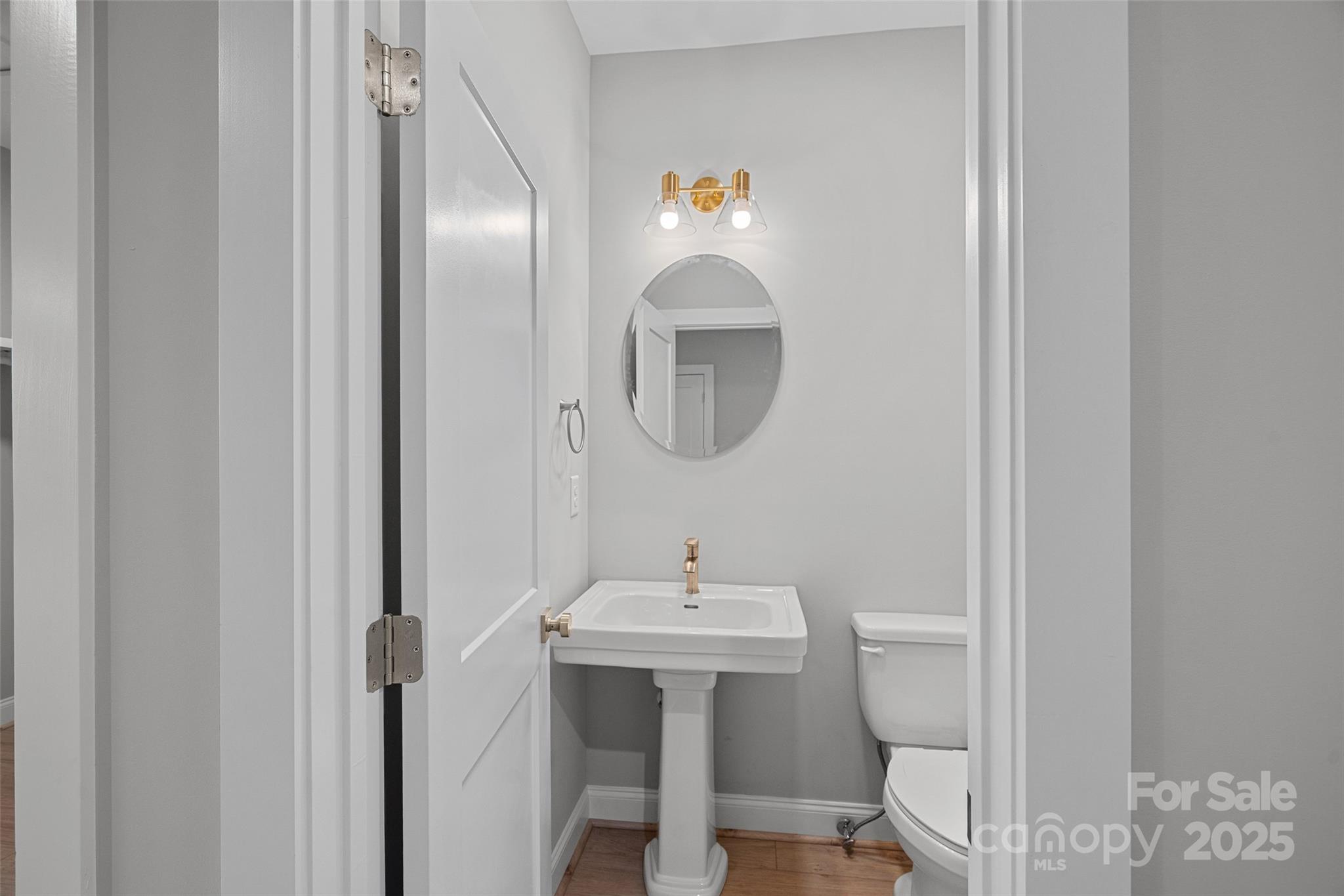 155 Rimrock Road Harmony, NC 28634 - Photo 19 of 39 a bathroom with a sink and a mirror