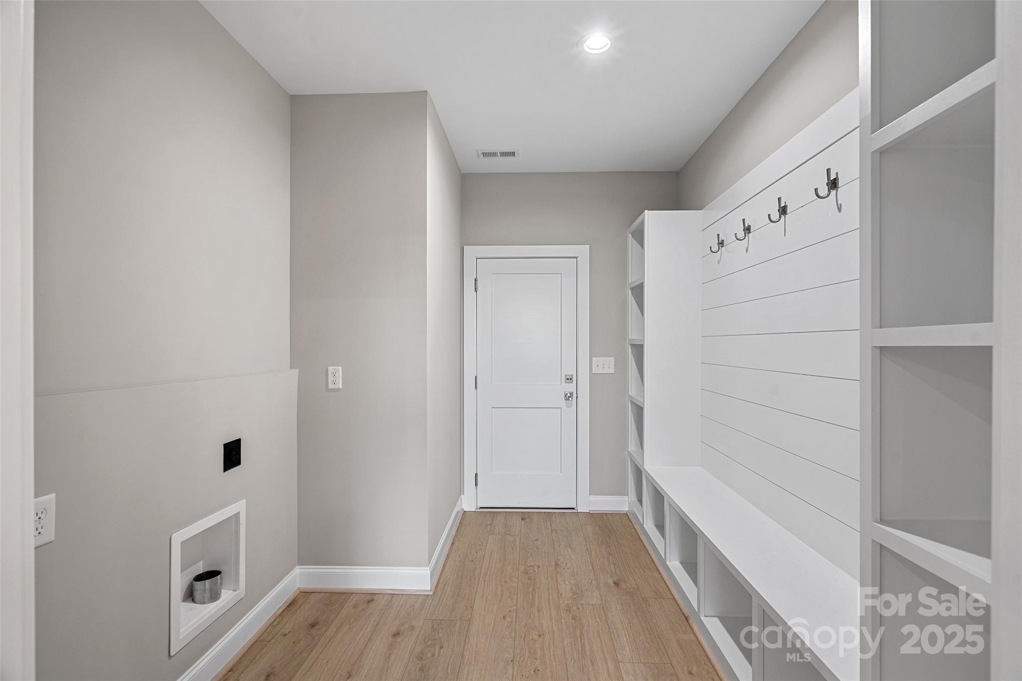 155 Rimrock Road Harmony, NC 28634 - Photo 20 of 39 a view of bathroom with bathtub wooden floor and window
