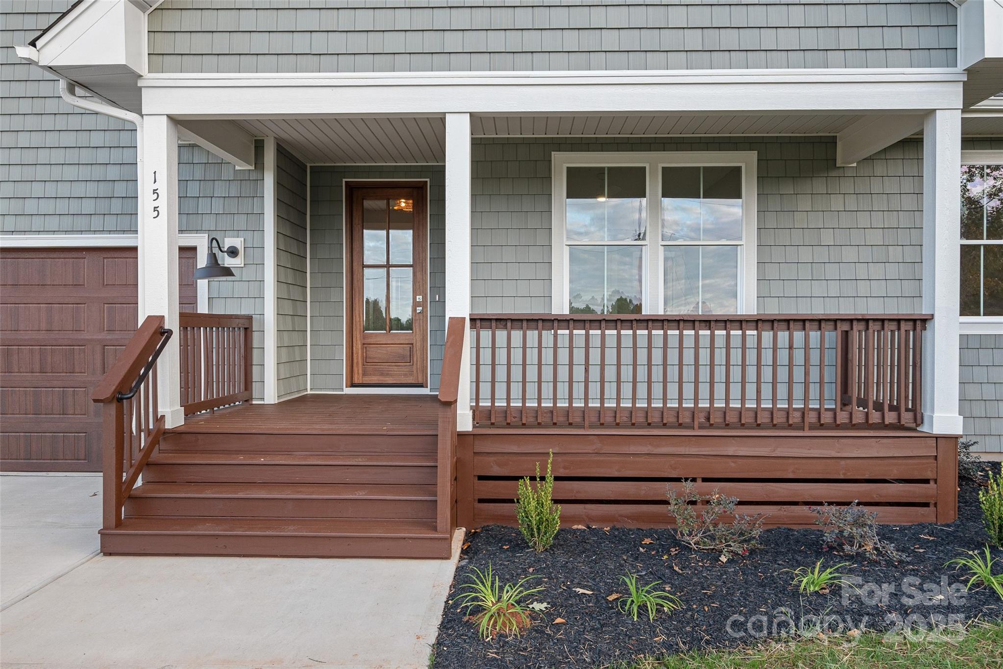 155 Rimrock Road Harmony, NC 28634 - Photo 3 of 39 a view of bench and wooden fence