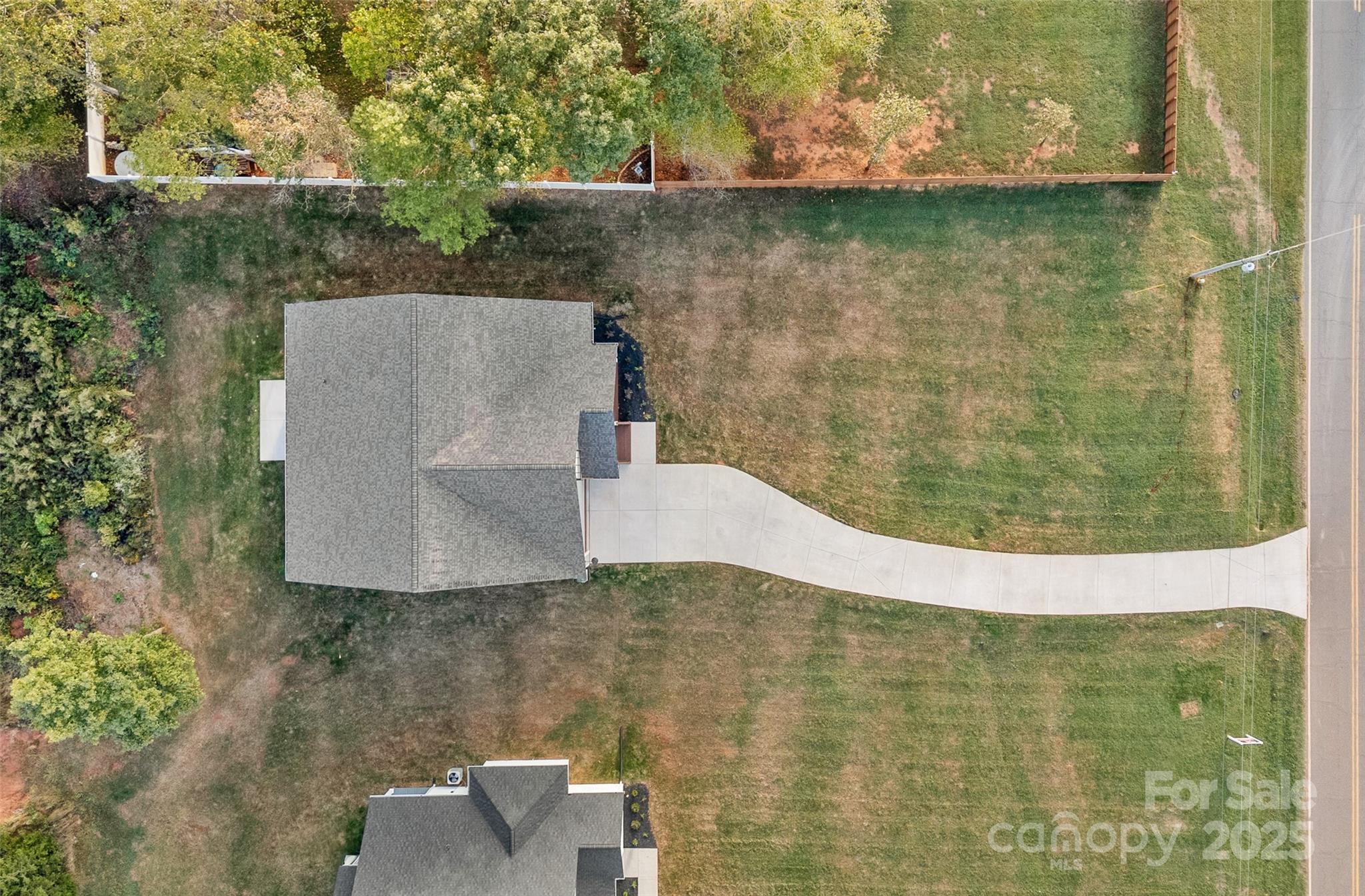 155 Rimrock Road Harmony, NC 28634 - Photo 37 of 39 a view of a brick wall and a window