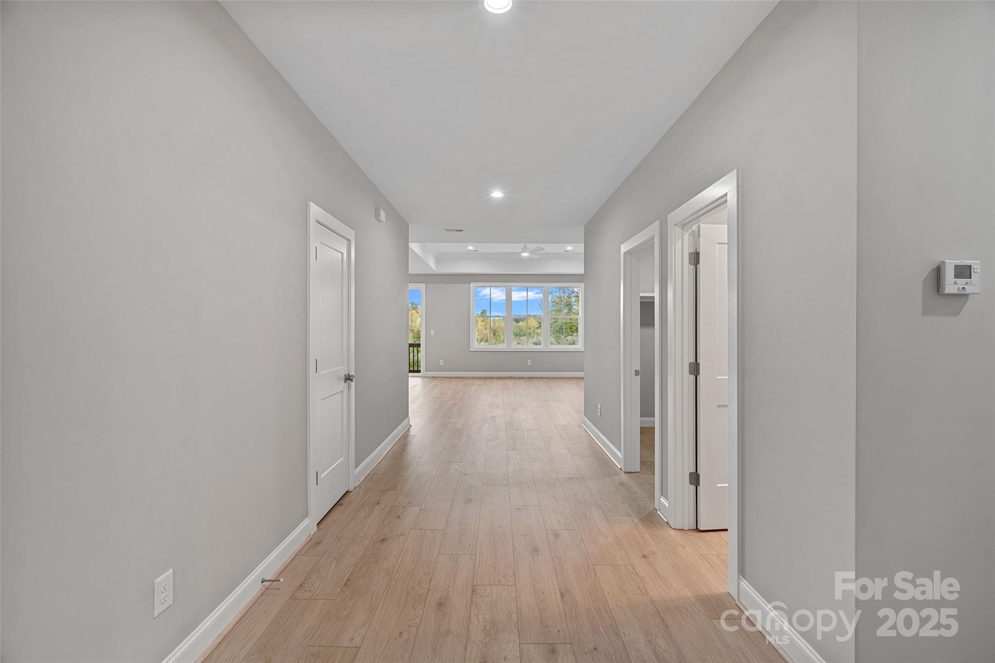 155 Rimrock Road Harmony, NC 28634 - Photo 5 of 39 a view of a hallway with wooden floor