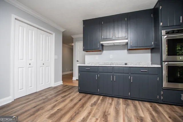 a view of a bathroom from a hallway