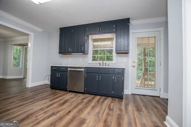 a bathroom with a sink a toilet and a bathtub