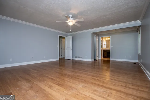 a view of an empty walk in closet