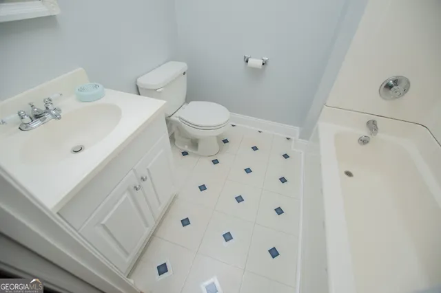 a view of a balcony with furniture