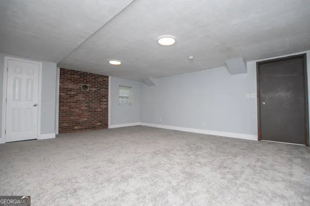 a backyard of a house with lots of green space