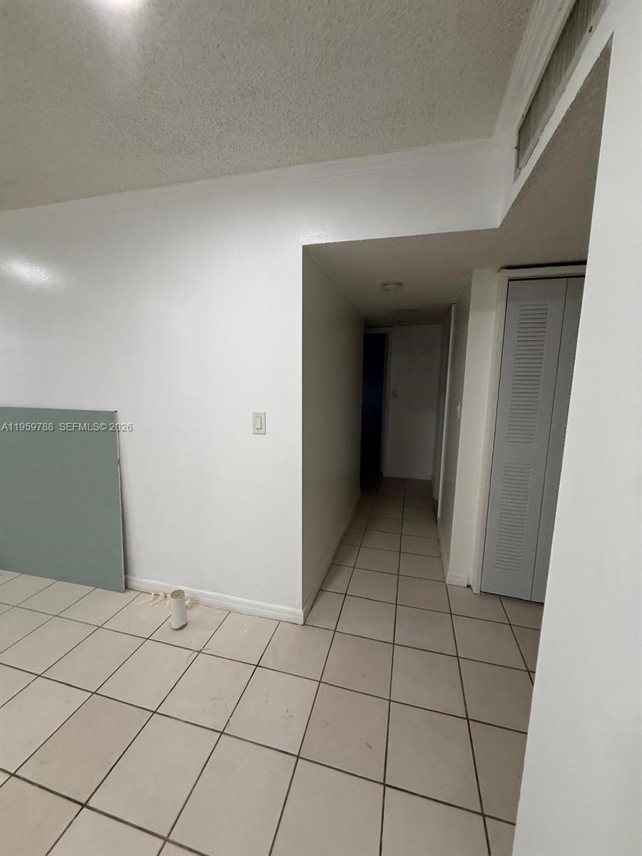 9520 Southwest 8th Street, Unit 111 Miami, FL 33174 - Photo 13 of 31 a view of an empty room