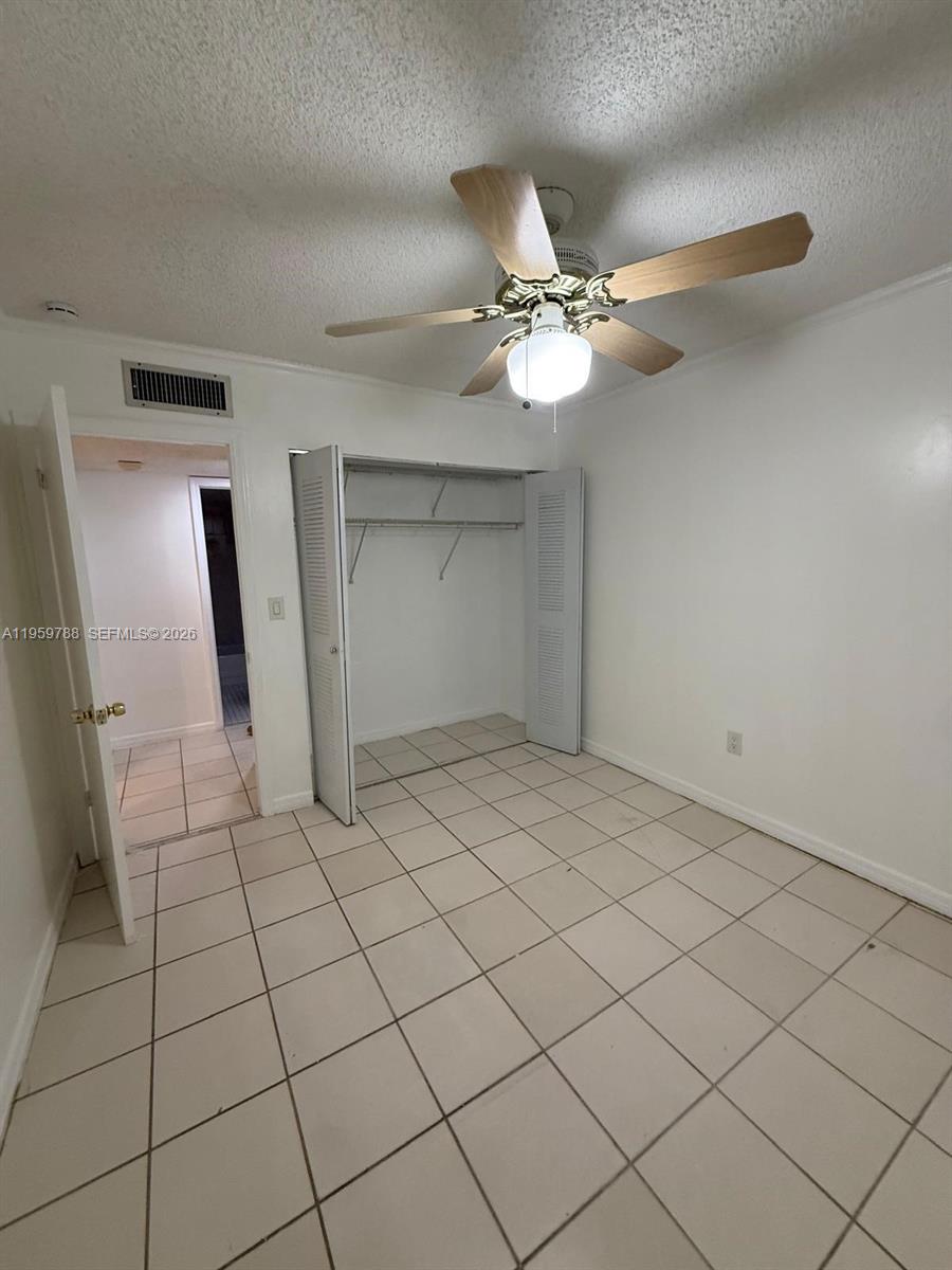 9520 Southwest 8th Street, Unit 111 Miami, FL 33174 - Photo 2 of 31 a view of a livingroom with closet